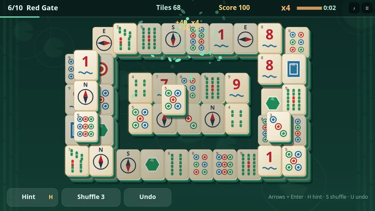 Two matched tiles flying together in a burst of petals with a combo score pop-up