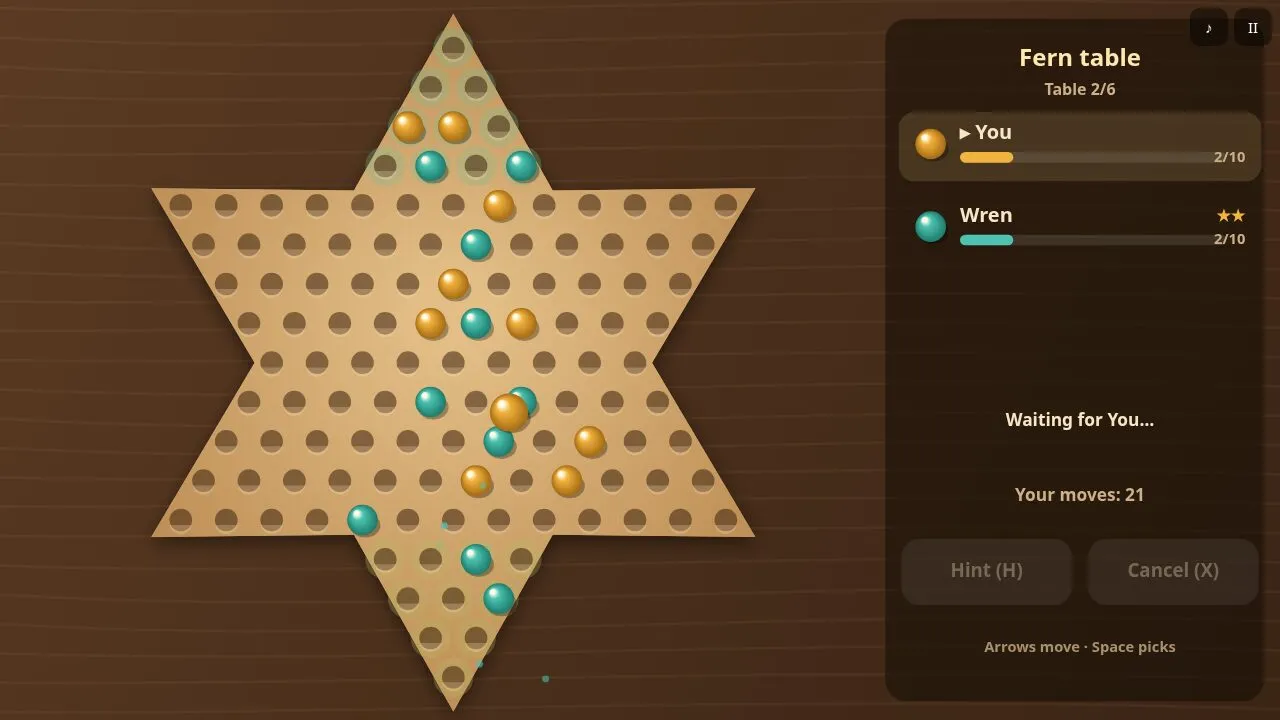 Mid-game with marbles crossing the centre and the trail of the last chain of hops
