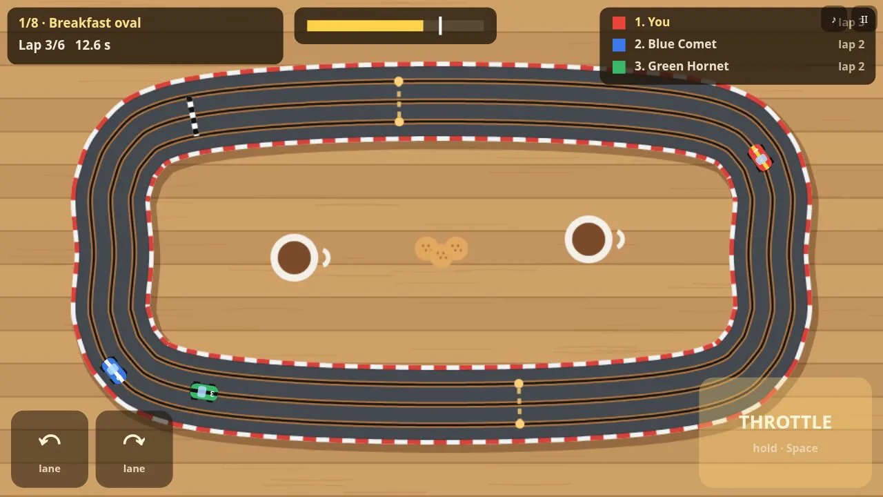 Three slot cars on the breakfast oval with the start lights