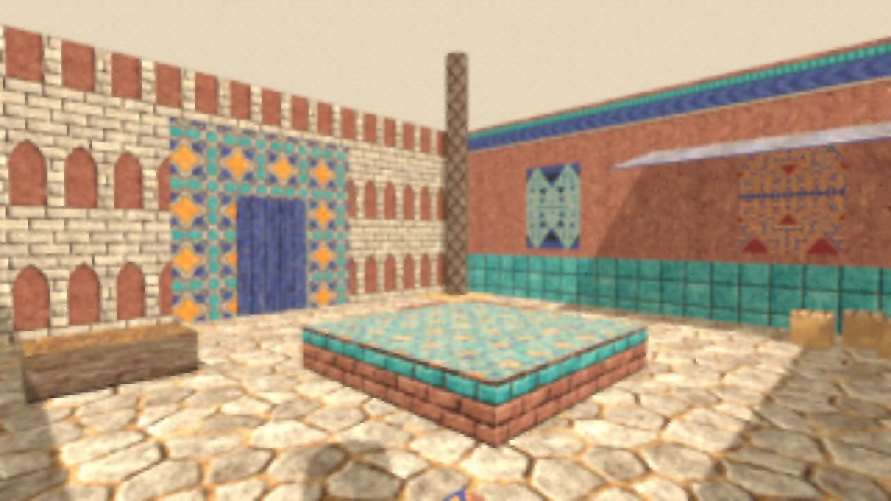 The same courtyard from the side: rose adobe with a glazed tile band, two hanging rugs, a fountain with a mosaic top and a wooden bench