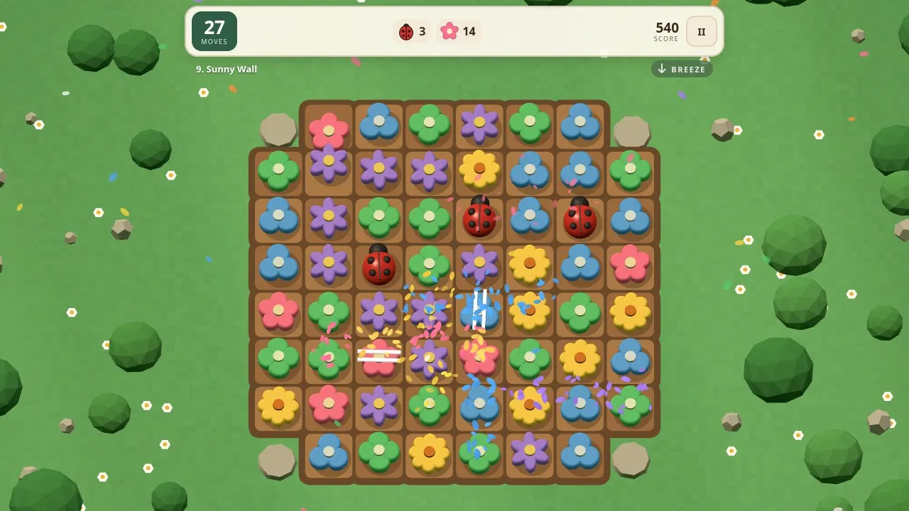 Swaybloom in play: a garden bed of blossoms with ladybirds and the goals at the top