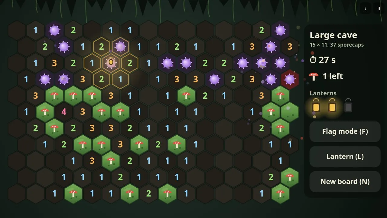 A large board with a glowing lantern lighting a cluster of cells