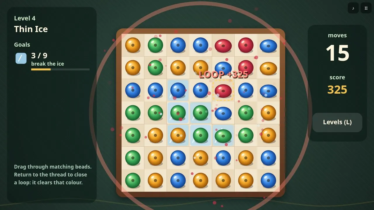Thin Ice: a closed loop has cleared every red bead, ice tiles in the middle of the tray